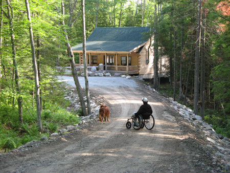 wheelchair user on backroad